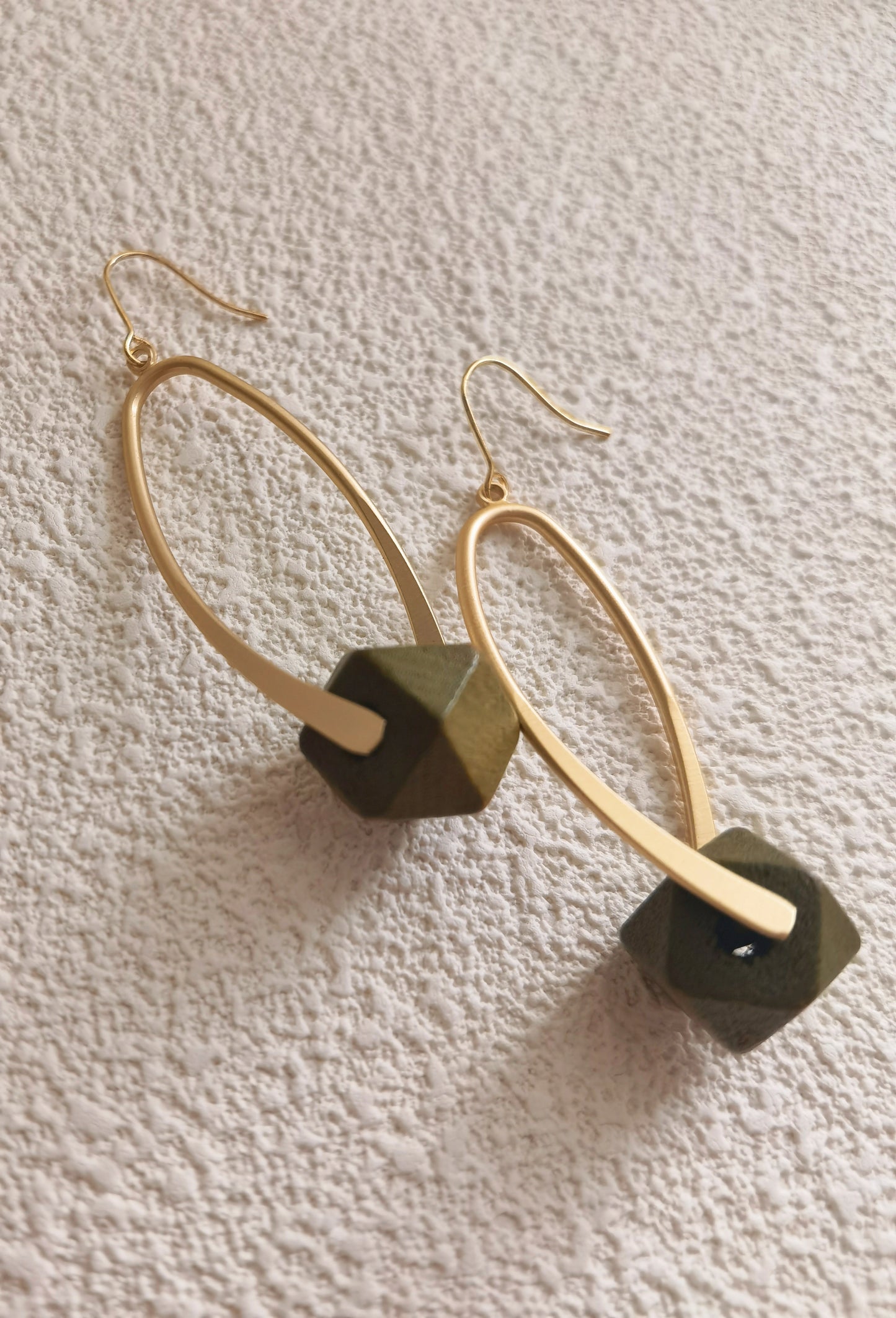 green wooden earrings